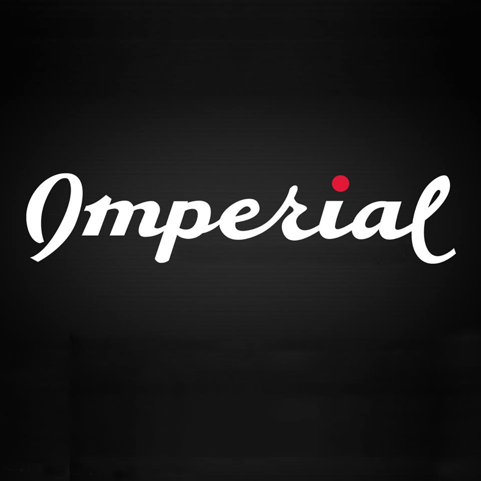 Imperial script logo in white with red dot above i on black field